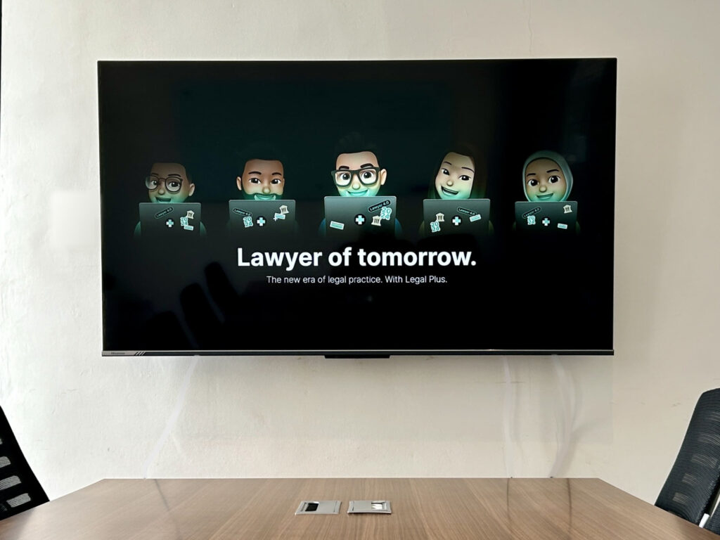 Layar presentasi dengan slogan “Lawyer of tomorrow” dari LegalPlus, memperlihatkan avatar digital advokat dan tagline “The new era of legal practice. With LegalPlus.”
